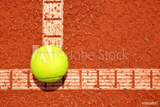 Picture of Tennis ball on a tennis clay court